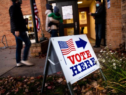 MINNEAPOLIS, MN - NOVEMBER 02: Voters arrive at Bryn Mawr Community School on Election Day on November 2, 2021 in Minneapolis, Minnesota. The mayor's position, and amendments addressing policing, housing, and executive power are all on todays ballot. (Photo by Stephen Maturen/Getty Images)