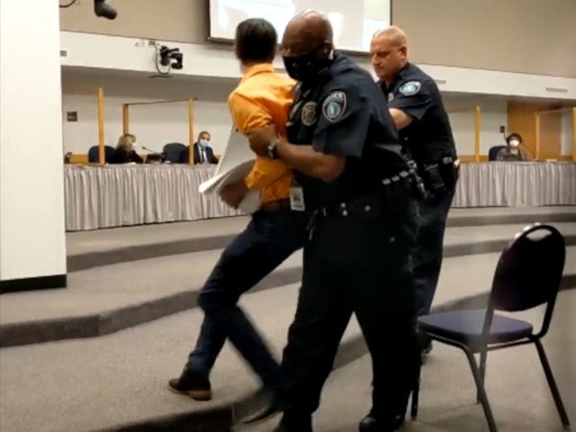 Jeremy Story forcibly removed from RRISD school board meeting by police. (Jeremy Story / F