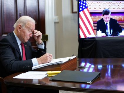 US President Joe Biden gestures as he meets with China's President Xi Jinping during a virtual summit from the Roosevelt Room of the White House in Washington, DC, November 15, 2021. (Photo by MANDEL NGAN / AFP) (Photo by MANDEL NGAN/AFP via Getty Images)