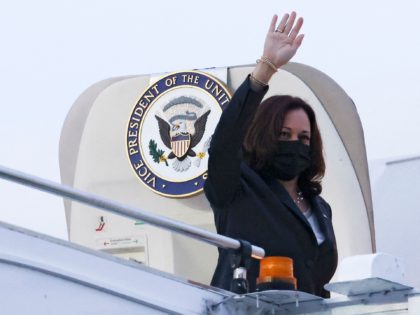 US Vice President Kamala Harris waves before departing Singapore on August 24, 2021, as she travels next to Vietnam. (Photo by EVELYN HOCKSTEIN / POOL / AFP) (Photo by EVELYN HOCKSTEIN/POOL/AFP via Getty Images)