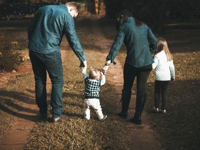 Family walking on path