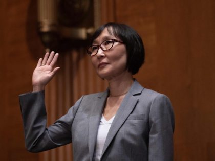 Nominee to be the Comptroller of the Currency Saule Omarova is sworn in before the Senate Banking, Housing and Urban Affairs Committee during a hearing on Capitol Hill in Washington, DC, on November 18, 2021. (Photo by Jim WATSON / AFP) (Photo by JIM WATSON/AFP via Getty Images)