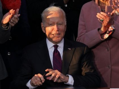 US President Joe Biden takes part in a signing ceremony for H.R. 3684, the Infrastructure
