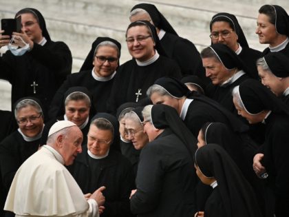 Pope Francis meets with a group of nuns at the end of the weekly general audience on Novem