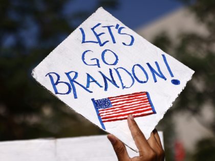LOS ANGELES, CALIFORNIA - NOVEMBER 08: A protestor holds a 'Let's Go Brandon!' sign in Grand Park at a ‘March for Freedom’ rally demonstrating against the L.A. City Council’s COVID-19 vaccine mandate for city employees and contractors on November 8, 2021 in Los Angeles, California. The City Council has set …