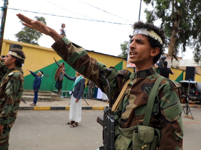 Security forces loyal to Yemen's Shiite Huthi rebels perform a salute during a gathering in the Huthi-held capital Sanaa on August 8, 2020, celebrating Eid al-Ghadir, which commemorates the events of Ghadir al-Khumm, during which Shiites believe that the Prophet Mohammed designated Ali as his successor. (Mohammed Huwais/AFP via Getty Images)