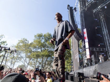 Travi$ Scott performs at The Budweiser Made In America Festival on Sunday, Sept. 4, 2016, in Philadelphia. (Photo by Michael Zorn/Invision/AP)