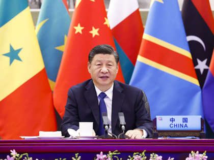 In this photo released by Xinhua News Agency, Chinese President Xi Jinping delivers a keynote speech at the opening ceremony of the Eighth Ministerial Conference of the Forum on China-Africa Cooperation (FOCAC) via video link in Beijing on Monday, Nov. 29, 2021. China has pledged to donate 600 million doses …