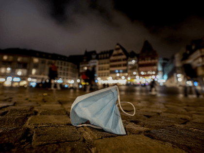 A face mask was left back on the Roemerberg square in Frankfurt, Saturday, Nov.. 6, 2021.