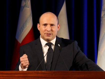 Israeli Prime Minister Naftali Bennett gives a speech during a ceremony for the Jewish hol
