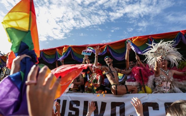 Revelers take part in the 30th Pride Parade in Buenos Aires, Argentina
