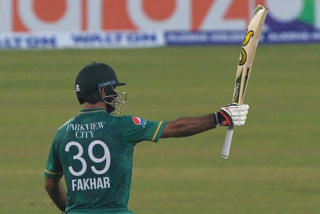 Pakistan's Fakhar Zaman raises his bat to celebrate a half century (50 runs) during the se