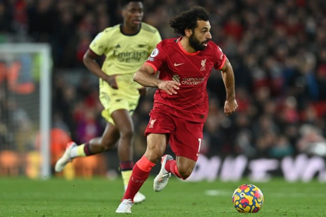 Egyptian Mohamed Salah (R) attacks for Liverpool during a 4-0 triumph over Arsenal at Anfi