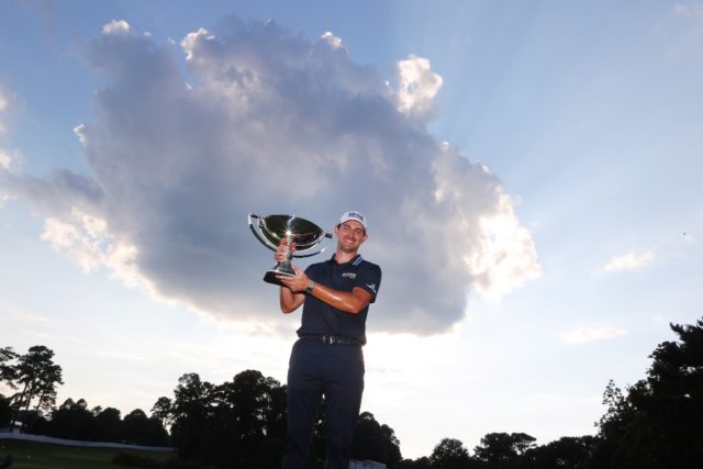 Patrick Cantlay celebrates victory in the FedEx Cup earlier this year; prize money for the