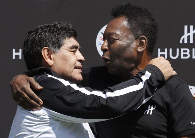 Football legends Diego Maradona (L) and Pele are seen together in 2016