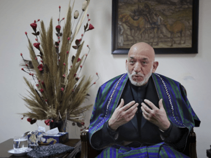 Former Afghan President Hamid Karzai speaks during an interview with The Associated Press,