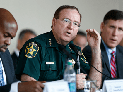 Commissioner and Polk County Sheriff, Grady Judd, center, asks a question during the Marjory Stoneman Douglas High School Public Safety Commission Meeting, Thursday, June 7, 2018, in Sunrise, Fla. The commission Thursday will discuss diversion programs for students who commit crimes deemed minor. Suspect Nikolas Cruz was referred to a …