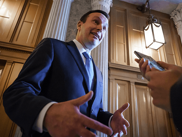 Sen. Chris Murphy, D-Conn., a leading voice in the Senate for gun control, speaks to a reporter outside the chamber at the Capitol in Washington, Wednesday, June 23, 2021. President Joe Biden announced new efforts Wednesday to stem a rising national tide of violent crime. (AP Photo/J. Scott Applewhite)