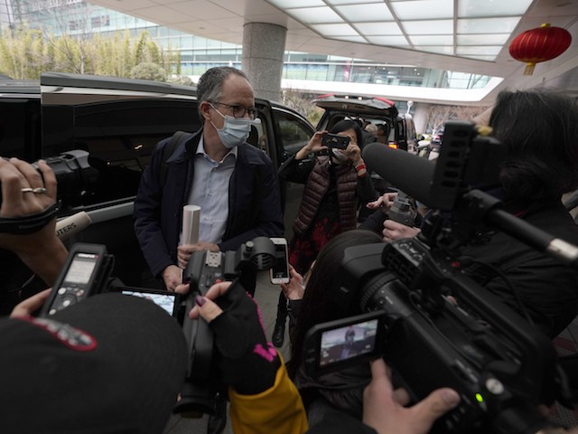 Peter Ben Embarek of the World Health Organization team speaks to journalists as he arrives at the VIP terminal of the airport to leave at the end of the WHO mission in Wuhan in central China's Hubei province on Wednesday, Feb. 10, 2021. (AP Photo/Ng Han Guan) ///