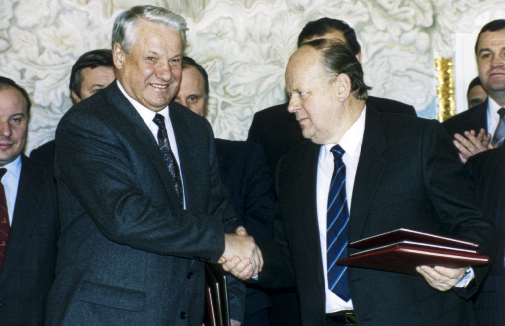 Russia's President Boris Yeltsin, left, and Belarus' leader Stanislav Shushkevich shake hands in Minsk, Belarus, on Dec. 7, 1991. The leaders of Soviet republics of Russia, Ukraine and Belarus signed an agreement terminating the Soviet Union and declaring the creation of the Commonwealth of Independent States in Viskuli, Belarus, on Dec. 8, 1991. (AP Photo/Alexander Zemlianichenko, File)