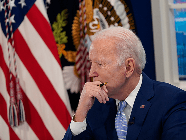 President Joe Biden attends a meeting with his task force on supply chain issues, Wednesday, Dec. 22, 2021, in the South Court Auditorium on the White House campus in Washington. (AP Photo/Patrick Semansky)