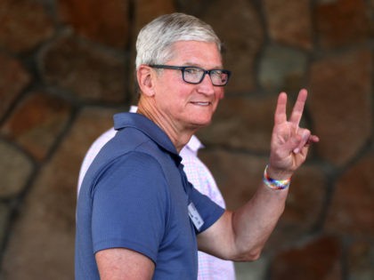 Apple CEO Tim Cook and his V for Victory