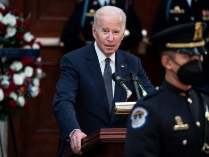 WASHINGTON, DC - DECEMBER 09: President Joe Biden speaks during a congressional ceremony to honor former Sen. Bob Dole, R-Kan., in the Rotunda of the U.S. Capitol building, where he will lie in state, on Capitol Hill on December 9, 2021 in Washington, DC. Dole, a veteran who was severely …