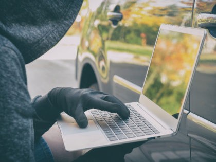 Car Thief on laptop