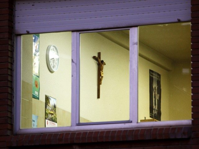 A crucifix hangs on the wall of a classroom in a school of the city of Burgos, northern Spain, on December 3, 2009. Spain has taken the first step towards banning crucifixes in schools in the wake of a European Court of Human Rights judgment against Italy which has annoyed …