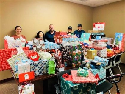 Border Patrol Fallen Agents Fund members deliver Christmas gifts to be delivered to the children of agents who died in the line of duty. (Border Patrol Fallen Agents Fund)