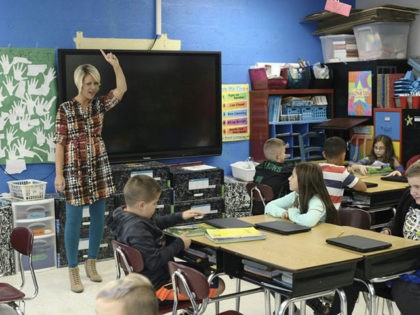 Amy Grady, who is running as an independent for a seat in the West Virginia state Senate, teaches in her classroom at Leon Elementary October 18, 2018 in Leon, West Virginia. - Teachers like Amy Grady successfully went on strike this year across West Virginia demanding better health care and …