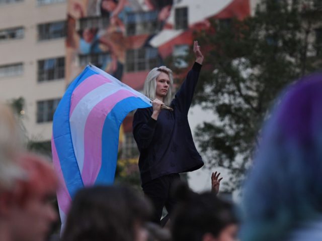 Members of the Transgender community and their supporters hold a rally and march to City Hall before the mid-term elections to protest against what they say are continual attacks from the Trump administration, in Los Angeles, California on November 2, 2018. (Photo by Mark RALSTON / AFP) (Photo credit should …