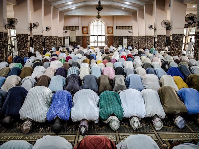 Fulani muslim men pray in Masallacin Shehu Mosque, Sokoto, Sokoto State, Nigeria, on April