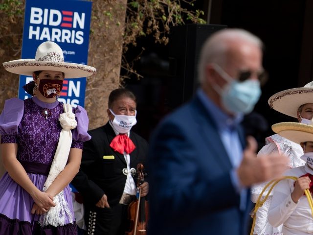 Supporters listen as Democratic presidential candidate Joe Biden speak at the East Las Vegas Community Center about the effects of Covid-19 on Latinos, October 9, 2020, in Las Vegas, Nevada. (Photo by Brendan Smialowski / AFP) (Photo by BRENDAN SMIALOWSKI/AFP via Getty Images)