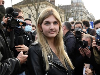Thaïs d'Escufon, spokesperson of far right group Generation Identitaire (GI), takes part in a protest against the group's potential dissolution in Paris on February 20, 2021. - The dissolution of Generation identitaire was evoked for the first time on January 26, 2021 by Interior Minister, as a reaction to the …