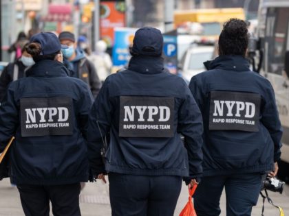 NEW YORK, NEW YORK - MARCH 17: NYPD officers hand out information about hate crimes in Asi
