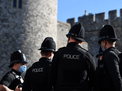 Police are directed to positions at Windsor Castle in Windsor, west of London, on April 15