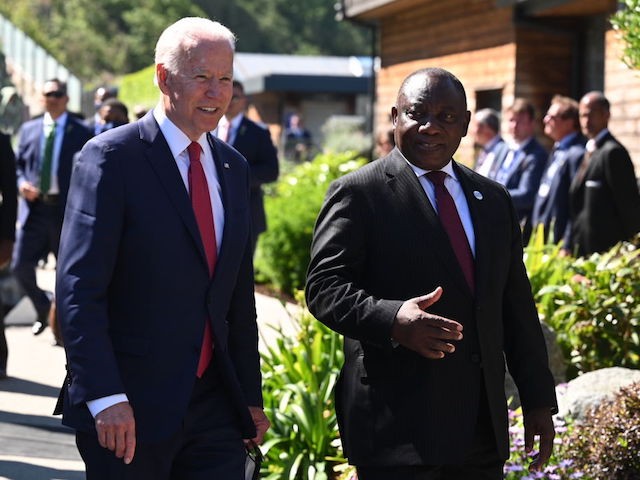 CARBIS BAY, CORNWALL - JUNE 12: US President Joe Biden talks with South Africa's President Cyril Ramaphosa at the G7 summit in Carbis Bay on June 12, 2021 in Carbis Bay, Cornwall. UK Prime Minister, Boris Johnson, hosts leaders from the USA, Japan, Germany, France, Italy and Canada at the G7 Summit. This year the UK has invited India, South Africa, and South Korea to attend the Leaders' Summit as guest countries as well as the EU. (Photo by Leon Neal/Getty Images)