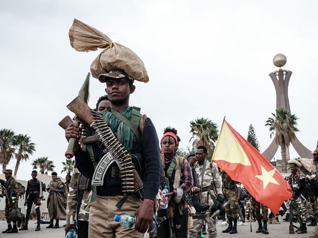 TOPSHOT - Tigray People's Liberation Front (TPLF) fighters prepare to leave for another field at Tigray Martyr's Memorial Monument Center in Mekele, the capital of Tigray region, Ethiopia, on June 30, 2021. - Rebel fighters in Ethiopia's war-hit Tigray seized control of more territory on June 29, 2021, one day after retaking the local capital and vowing to drive all "enemies" out of the region. (Photo by Yasuyoshi Chiba / AFP) (Photo by YASUYOSHI CHIBA/AFP via Getty Images)