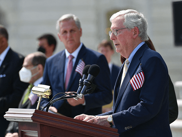 Senate Minority Leader Mitch McConnell(R-KY) speaks as House Speaker Nancy Pelosi, D-CA, and Senate Majority Leader Chuck Schumer along with House Minority Leader Kevin McCarthy and other members of Congress take part in a ceremony to commemorate the 20th anniversary of the 9/11 attacks on the steps of the US Capitol in Washington, DC on September 13, 2021. (Photo by MANDEL NGAN / AFP) (Photo by MANDEL NGAN/AFP via Getty Images)