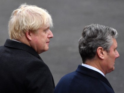 Britain's main opposition Labour Party leader Keir Starmer (R) and Britain's Prime Minister Boris Johnson (L) attend the Remembrance Sunday ceremony at the Cenotaph on Whitehall in central London, on November 14, 2021. - Remembrance Sunday is an annual commemoration held on the closest Sunday to Armistice Day, November 11, …