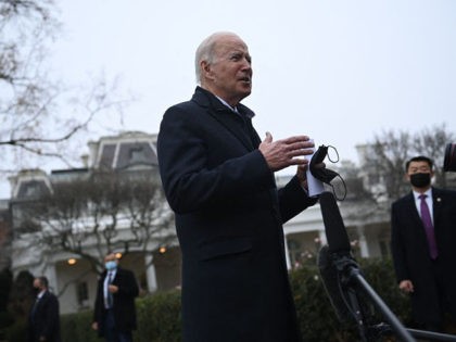 US President Joe Biden speaks to the press as he departs the White House in Washington, DC