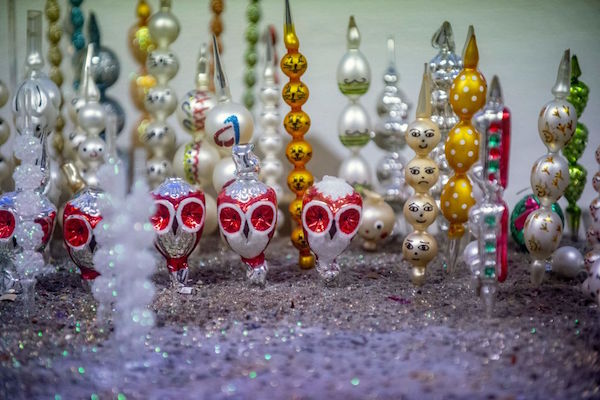 Newly painted Christmas tree decorations made of from blown glass beads are displayed on December 14, 2021 in a small family factory in Ponikla village, North Bohemia in the Czech Republic. - The handmade production of Christmas tree decorations from blown glass beads earned a place on the UNESCO list of intangible cultural heritage last year. The practice has survived until today only in Ponikla, whose local tradition has roots in a 19th-century love affair. - TO GO WITH AFP STORY by Jan FLEMR (Photo by Michal Cizek / AFP) / TO GO WITH AFP STORY by Jan FLEMR (Photo by MICHAL CIZEK/AFP via Getty Images)