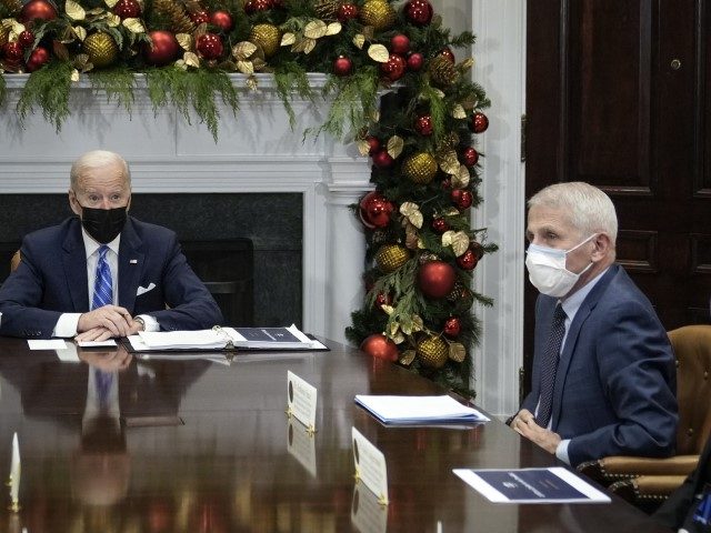 WASHINGTON, DC - DECEMBER 16: U.S. President Joe Biden speaks during a meeting with the White House COVID-19 Response Team, including National Institute of Allergy and Infectious Diseases Director Anthony Fauci (R), in the Roosevelt Room of the White House December 16, 2021, in Washington, DC. Biden made a brief …
