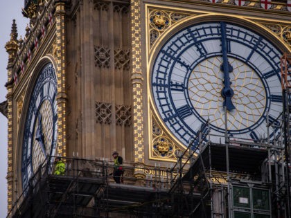 LONDON, ENGLAND - DECEMBER 20: Workers remove sections of scaffolding surrounding Elizabeth Tower, commonly known as Big Ben, as renovation works continue on December 20, 2021 in London, England. (Photo by Chris J Ratcliffe/Getty Images)