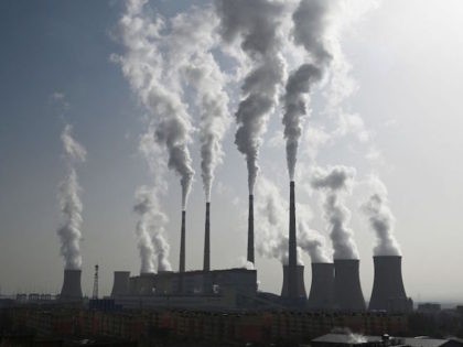 This photo taken on November 15, 2021 shows the coal-powered Datang International Zhangjiakou Power Station in Zhangjiakou, one of the host cities for the 2022 Winter Olympic Games, in China's northern Hebei province. - China is the world's biggest producer of wind turbines and solar panels, and the Winter Olympics …