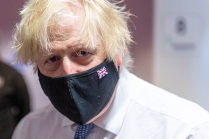 British Prime Minister Boris Johnson visits a Covid-19 vaccination centre at the Rainbow P