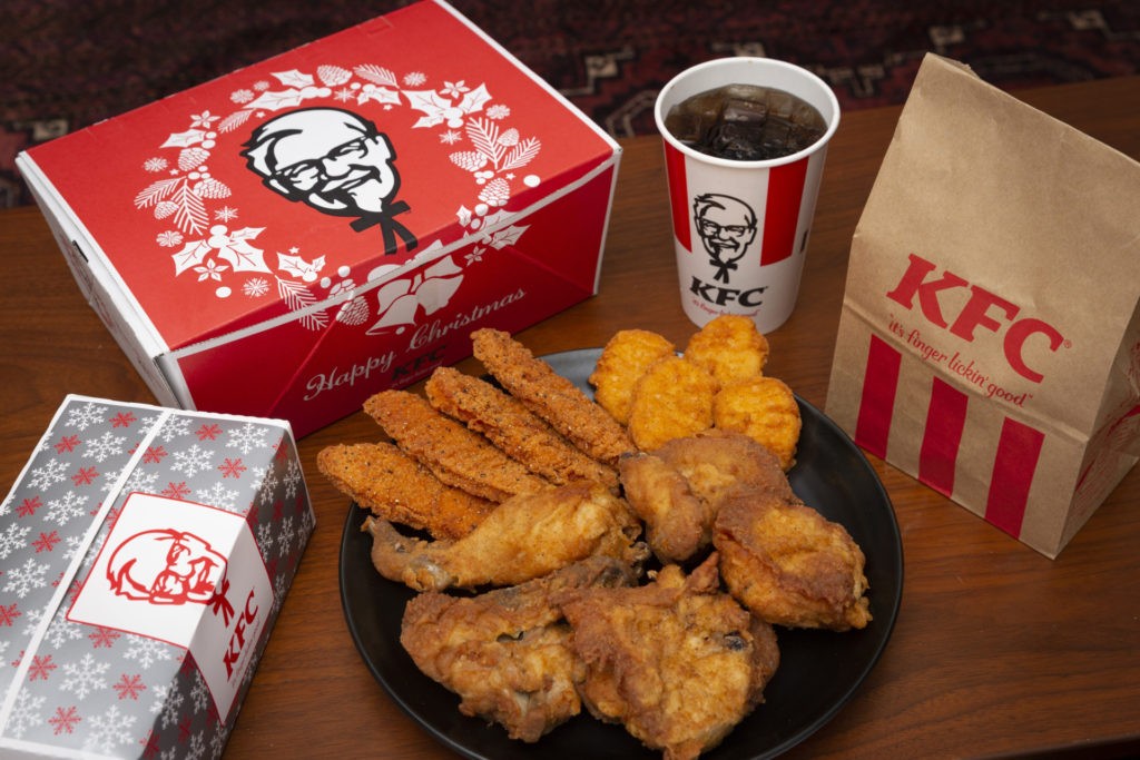 KFC Christmas meal boxes are pictured on December 23, 2020 in Tokyo, Japan. KFC at Christmas has become something of a tradition in Japan with some attributing its yuletide popularity to a kindergarten delivery being made in a Santa Claus outfit which was such a success it was requested by a number of other schools and subsequently gave the company the idea of associating its product to Christmas. The chain launched its first Christmas campaign in December 1974, and has continued to do so every year at all its outlets nationwide. In 2018, KFC Japan posted all-time high sales of roughly 68 million USD for the five days from December 21 to 25. Roughly 10 percent of its annual turnover for the entire year. (Photo by Yuichi Yamazaki/Getty Images)