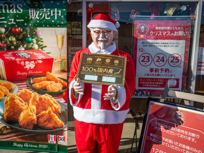 A statue of Colonel Sanders in Santa outfit is pictured on December 23, 2020 in Tokyo, Japan. KFC at Christmas has become something of a tradition in Japan with some attributing its yuletide popularity to a kindergarten delivery being made in a Santa Claus outfit which was such a success …