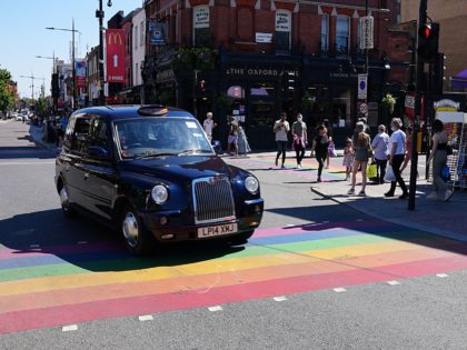 LONDON,UNITED KINGDOM - JUNE 01: A black cab travels over a rainbow crossing in Camden during UK Pride Month 2021 on June 01, 2021 in London, United Kingdom. June marks Pride month, it is a month dedicated to celebrating the LGBTQ+ communities all around the world. (Photo by Edward Smith/ …